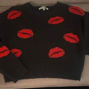 Steve Madden Black Sweater with Red Lip Accents